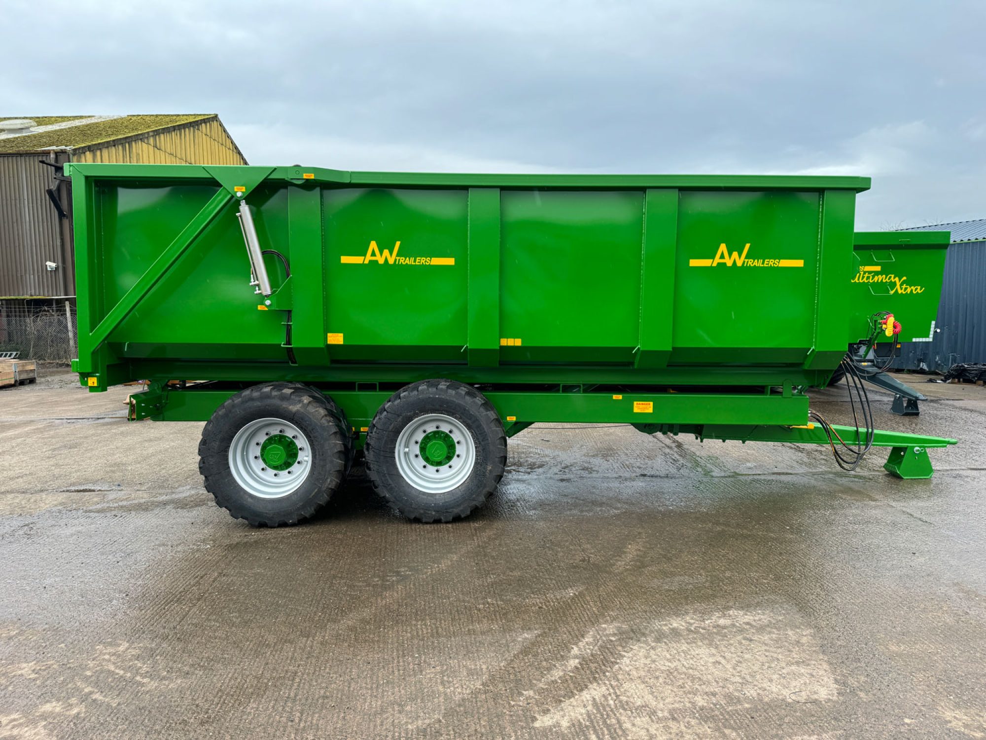 Green trailer in factory