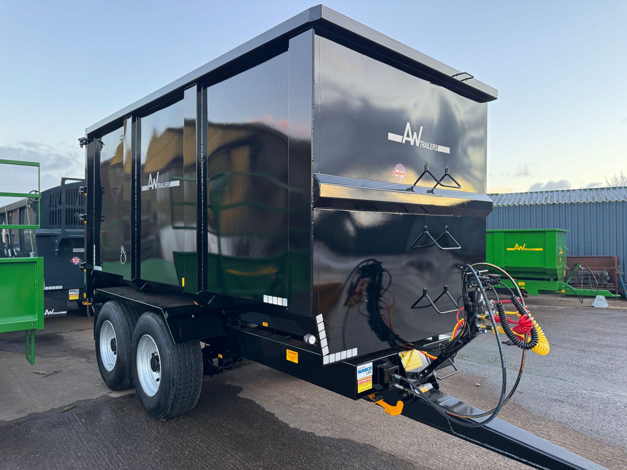 Black trailer in a factory