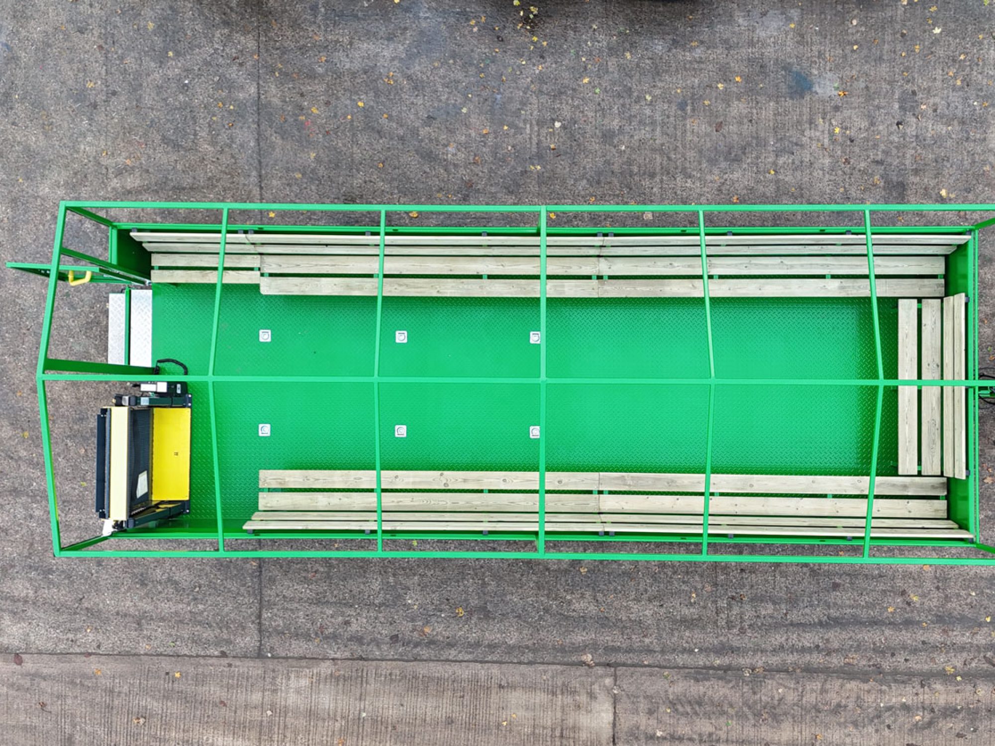 The top of a large green people carrier trailer