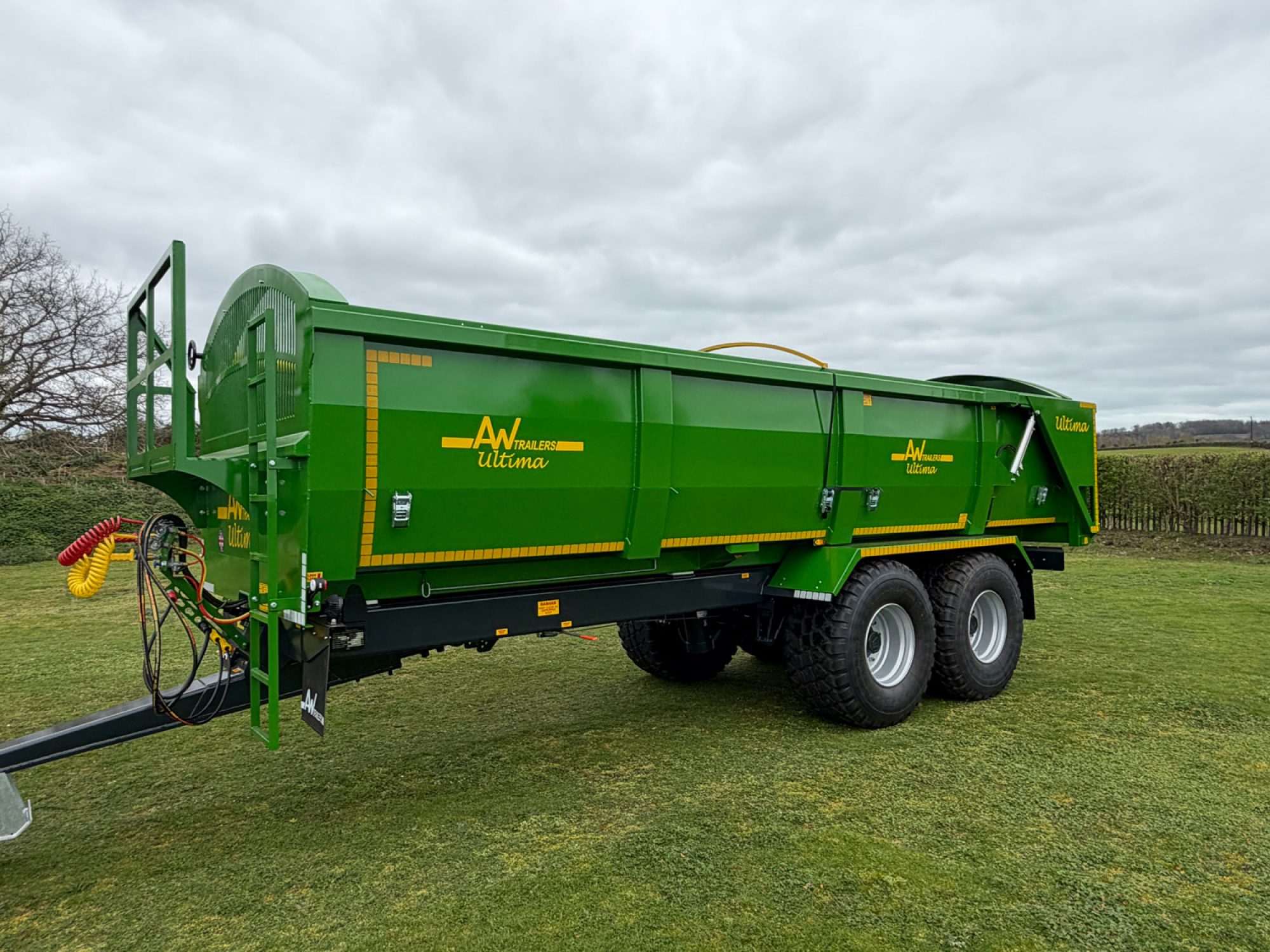A large Ultima Potato & Root trailer in a field