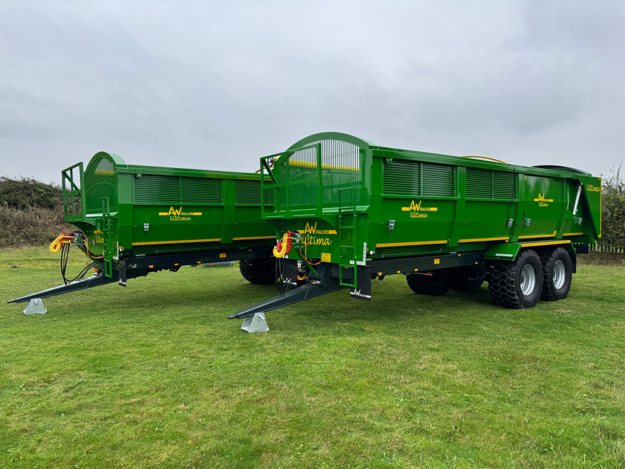 2 large Ultima Potato & Root trailers in a field
