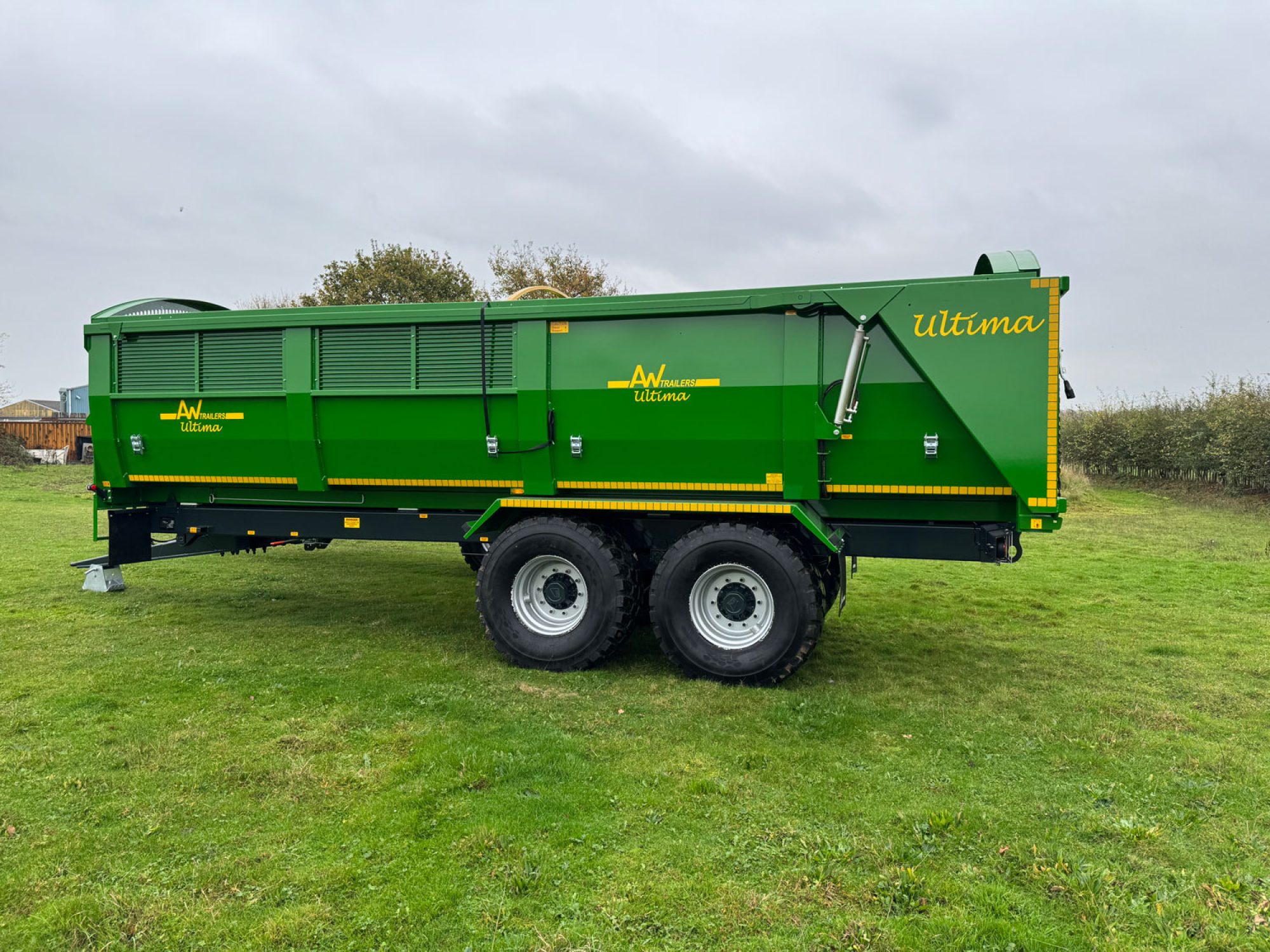 A large Ultima Potato & Root trailer in a field