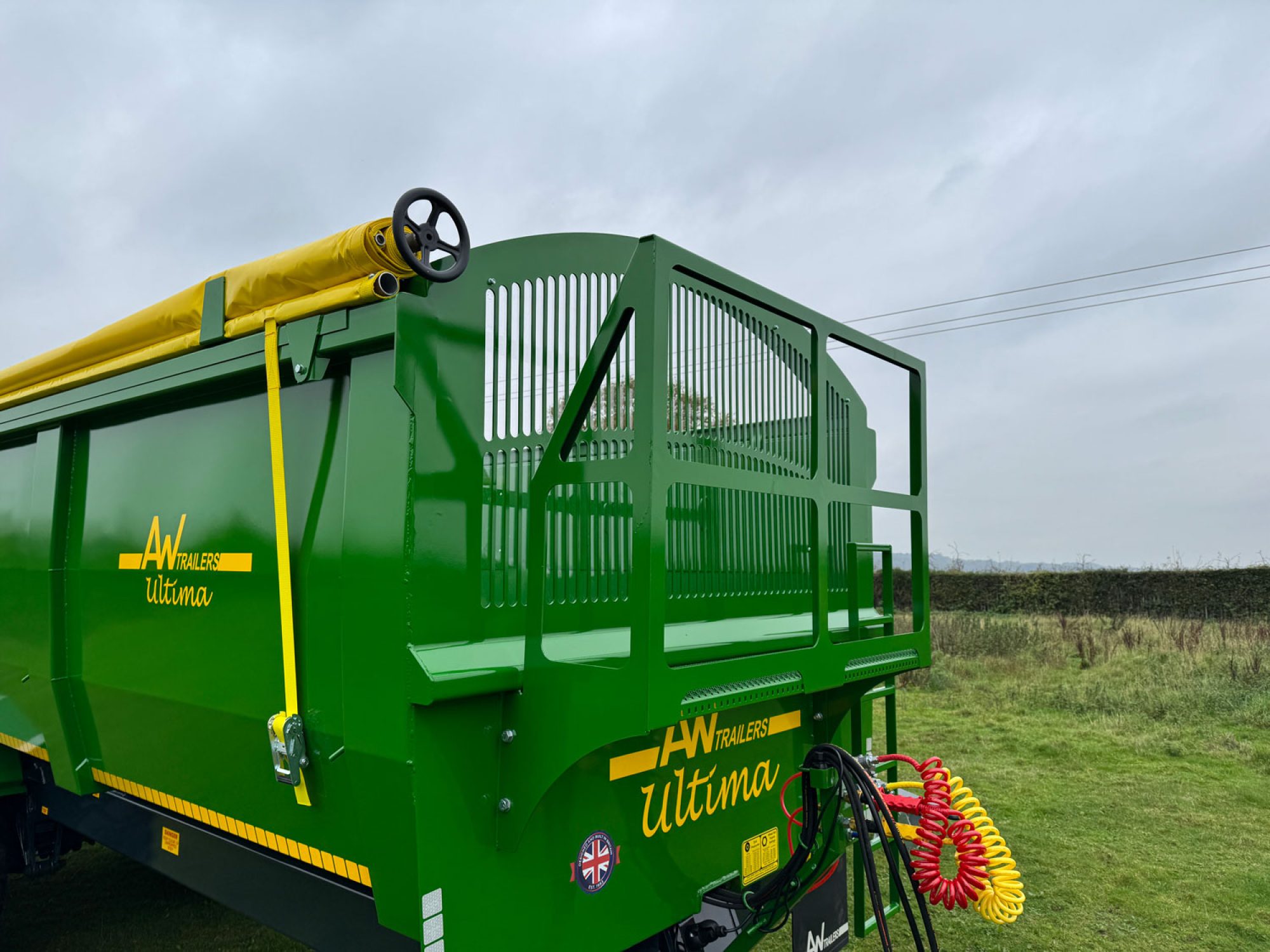A large Ultima Potato & Root trailer in a field